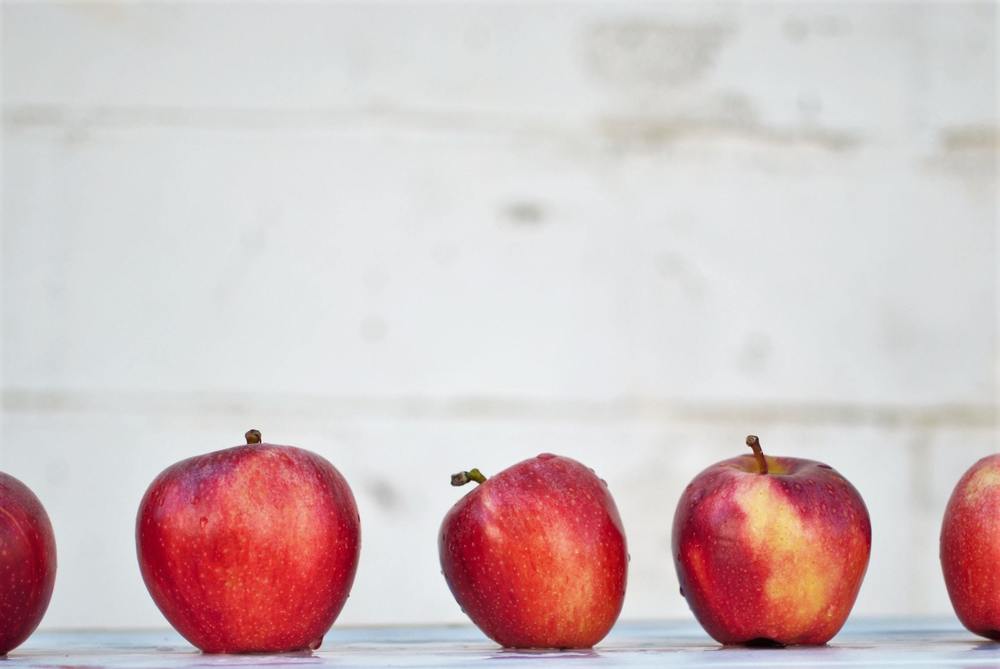 Image of apples in a row