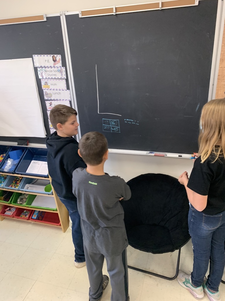 students working on a math problem